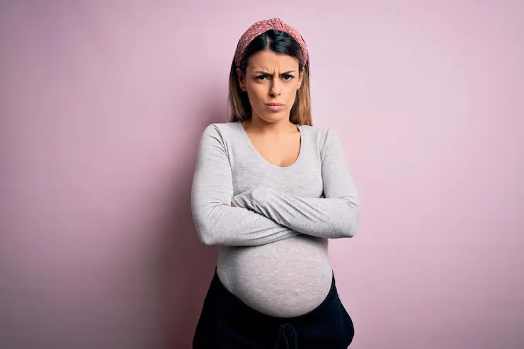 https://d2vvc091k8tmib.cloudfront.net/s3fs-public/2025-06/young-beautiful-brunette-woman-pregnant-expecting-baby-isolated-pink-background-skeptic-nervous-disapproving-expression-face-with-crossed-arms-negative-person_839833-16169.webp